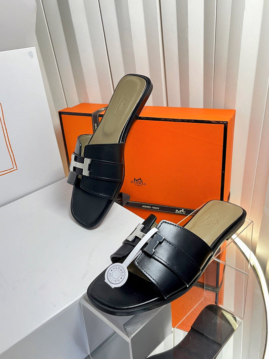 HM 26s Oran Sandals In Black Calfskin Silver Hardware
