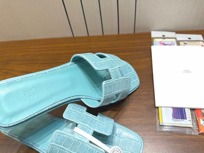 HM 26s Oran Slides Light Blue Crocodile-Embossed Leather