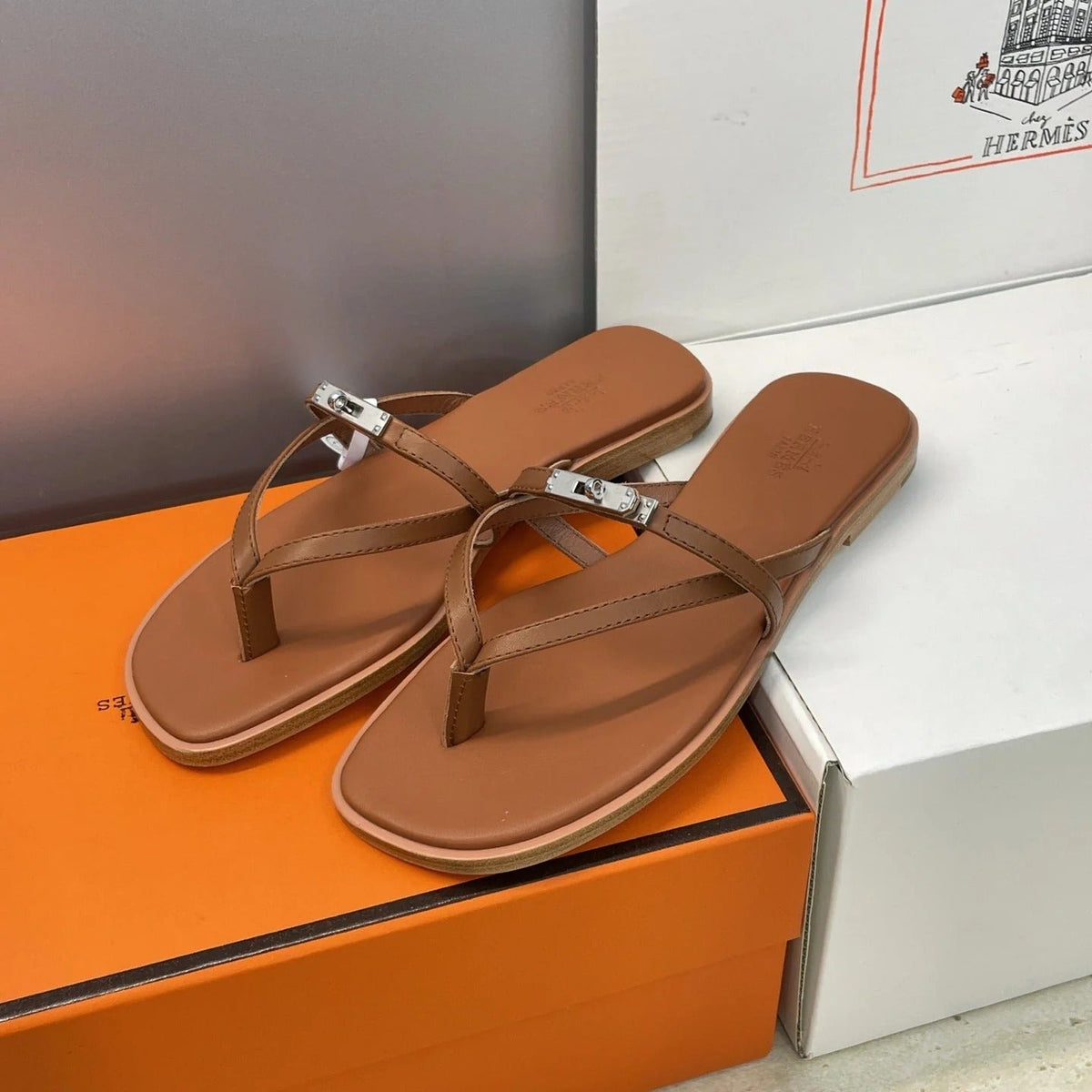 HM 26ss Kelly Sliver Buckle Slipper Brown Calfskin 607155