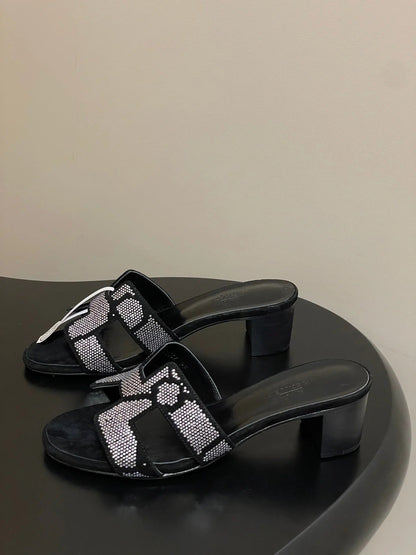 HM 25S ORAN HIGH‑HEEL SANDAL 50 MM IN BLACK LAMBSKIN WITH WHITE STONE DETAILS
